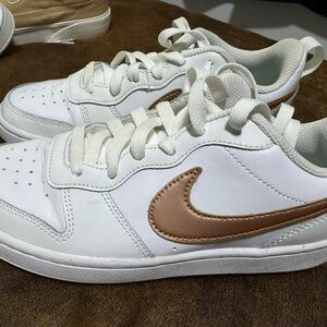 Nike Kids White Sneakers with Rose Gold Swoosh